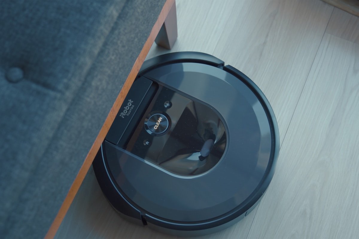 Robot vacuum cleaning a wooden floor